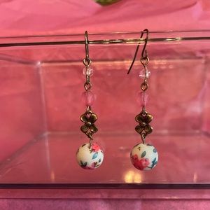 Pink and white dangling earrings